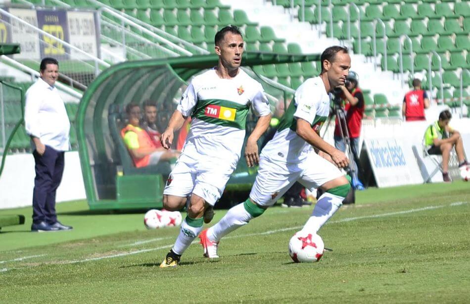 Collantes junto a Nino durante un partido con el Elche / Cristian Ripoll